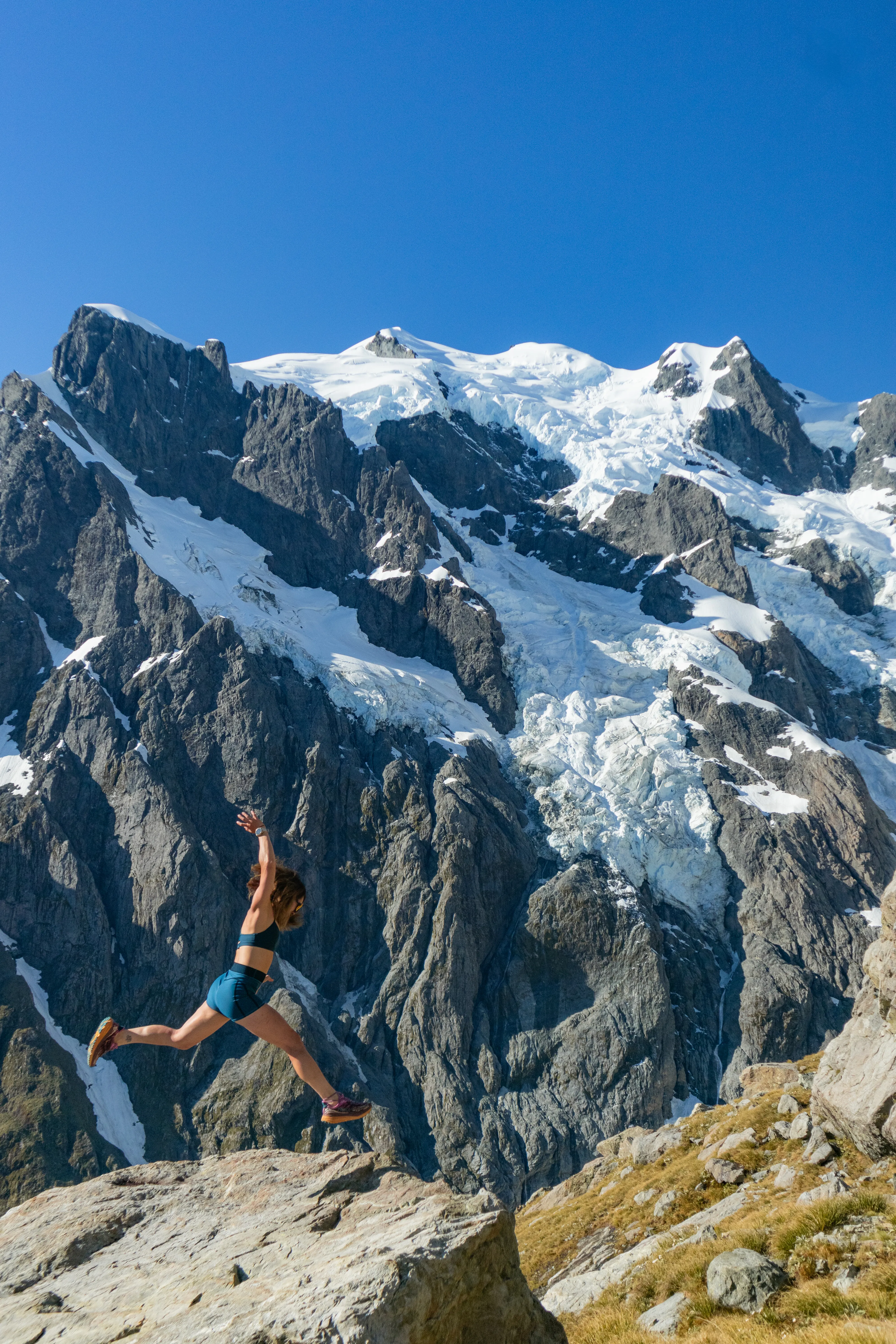 Climber high on a mountain ridge